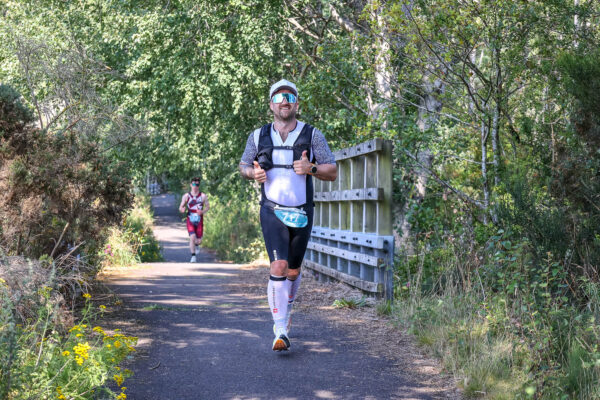 Athlete on the run leg of the Aberfeldy Triathlon 