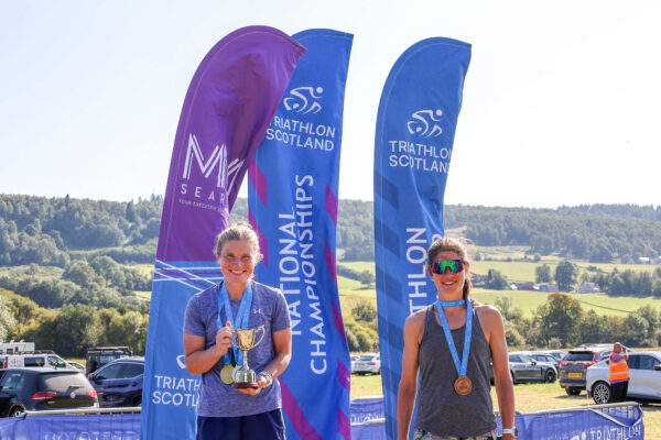 Triathletes on a podium 