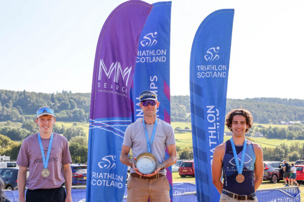 Podium of triathletes 
